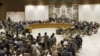 The United Nations Security Council votes on a resolution that threatens Syria with new sanctions, July 19, 2012.