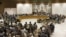 The United Nations Security Council votes on a resolution that threatens Syria with new sanctions, July 19, 2012.