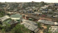 Aid groups say the strain of daily life in Rohingya refugee camps in Bangladesh, in which refugees are not allowed to leave, adds to emotional stress. (Dave Grunebaum/VOA)