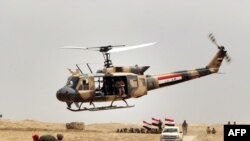 ទាហាន​អ៊ីរ៉ាក់​រាប់ពាន់​នាក់​បាន​ចូល​រួម​ក្នុង សមយុទ្ធ​ហ្វឹកហ្វឺន​មួយ ​ដែល​ដឹកនាំ​ដោយ​កង​ទ័ព ​អេស្ប៉ាញ​ និង​ក្រោម​ការ​ដឹក​នាំរបស់ក្រុម​យោធា​អាមេរិក នៅ​ជំរំុBasmaya នៅ​ក្នុងរដ្ឋធានីBaghdad នា​ថ្ងៃទី២៧ ខែឧសភា ឆ្នាំ២០១៥។