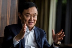 This picture taken on March 25, 2019, shows exiled former Thai prime minister Thaksin Shinawatra being interviewed by Agence France-presse in Hong Kong.