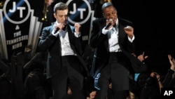 Justin Timberlake, left, and Jay-Z perform on stage at the 55th annual Grammy Awards on Feb. 10, 2013, in Los Angeles.