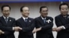 From left: South Korea's President Lee Myung-bak, China's Premier Wen Jiabao, Cambodia's Prime Minister Hun Sen and Japan's Prime Minister Yoshihiko Noda hold hands together during the ASEAN Plus Three (APT) Commemorative Summit in Phnom Penh, Cambodia, N