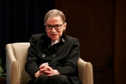 FILE - Supreme Court Justice Ruth Bader Ginsberg attends Georgetown Law's second annual Ruth Bader Ginsburg Lecture, October 30, 2019, in Washington.