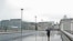 Walking across London Bridge on a rainy, wet day in June 2011 