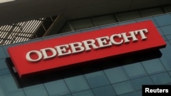 A sign of the Odebrecht Brazilian construction conglomerate is seen at their headquarters in Lima, Peru, Jan. 5, 2017. 