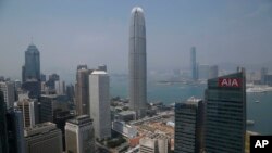 FILE - A general view of skyscrapers in Hong Kong. Some are beginning to question Hong Kong’s diminishing viability as a global financial center. 