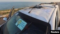 A view of a vehicle where employees from the World Central Kitchen were killed in an Israeli airstrike, according to the NGO. The Israeli military said it was conducting a thorough review to understand the circumstances, in Deir Al-Balah, in the central Gaza Strip April 2, 2024. 