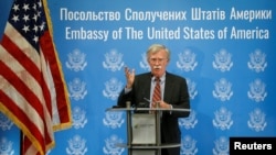 U.S. President Donald Trump's national security adviser John Bolton speaks at a news conference in Kyiv, Ukraine, Aug. 24, 2018.
