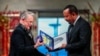 Ethiopian Prime Minister Abiy Ahmed Ali receives medal and diploma from Chair of the Nobel Comitteee Berit Reiss-Andersen during Nobel Peace Prize awarding ceremony in Oslo City Hall, Norway, Dec. 10, 2019. 
