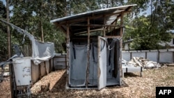 A picture taken in the early hours on March 9, 2019 in Butembo, shows burned equipment inside an Ebola treatment center which was attacked in the eastern part of the Democratic Republic of Congo.