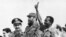 FILE - Ethiopian President Lieutenant Colonel Mengistu Haile Mariam (R) makes V sign as he stands with Fidel Castro (C) and Raul Castro (L) during an official visit in La Havana, Cuba, Apr. 25, 1975. Mengistu took part in the attempted coup against Haile Selassie in 1960 and in 1977 after a further coup he became undisputed ruler of his country. He was overthrown in 1991 by the Ethiopian People's Democratic Front. 