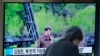A TV screen shows an image of North Korean leader Kim Jong Un during a news program at the Seoul Railway Station in Seoul, South Korea, April 23, 2024. Kim Jong Un supervised salvo launches that simulated a nuclear counterattack against enemy targets, state media said Tuesday.