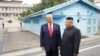 FILE - U.S. President Donald Trump meets with North Korean leader Kim Jong Un at the demilitarized zone separating the two Koreas, in Panmunjom, South Korea, June 30, 2019.