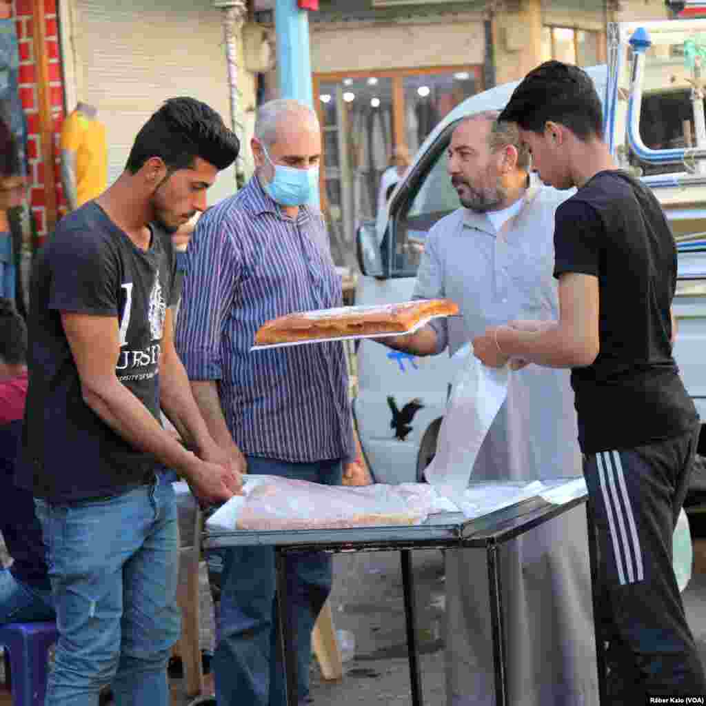 Wêneyên Dawiya Meha Remezanê ji Bajarê Reqa