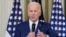 FILE - President Joe Biden answers questions from reporters as he speaks in the State Dining Room of the White House in Washington, Nov. 9, 2022.