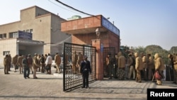 Policemen report for duty at a district court, where the accused in a gang rape are to be produced for trial, in New Delhi, India, January 10, 2013.