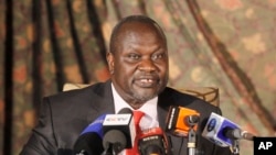 FILE - South Sudan rebel leader Riek Machar addresses journalists during a news conference in Nairobi, Kenya, July 8, 2015. 