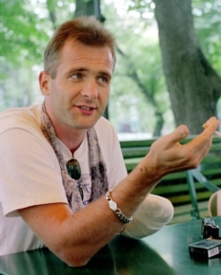 FILE - In this Aug. 2000 photo, investigative journalist Heorhiy Gongadze is seen during an interview in the Ukrainian capital Kyiv, a month before his abduction and murder.