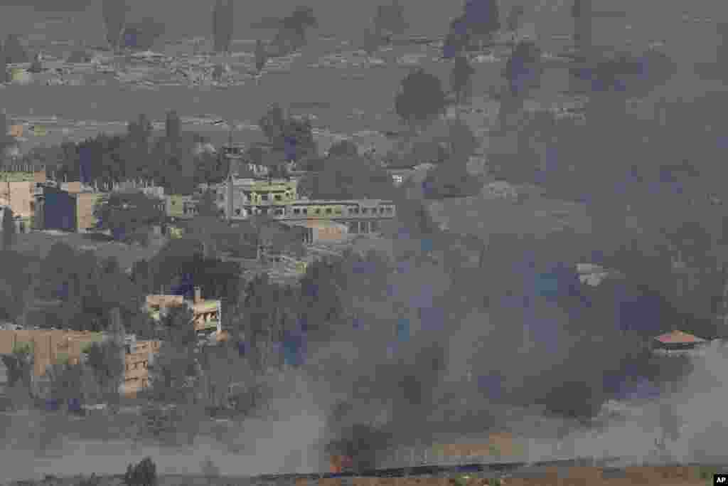 Smoke and fire rise in the Quneitra province as Syrian rebels clash with President Bashar al-Assad&rsquo;s forces, as seen from the Israeli controlled-Golan Heights, Aug. 27, 2014.&nbsp;