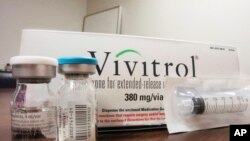 FILE - This Oct. 19, 2016, file photo shows the packaging of Vivitrol at an addiction treatment center in Joliet, Ill. A study finds only 1 in 4 teens and young adults with opioid addiction receive recommended treatment medication despite having good health insurance. 
