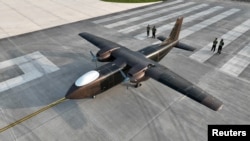 An unmanned cargo aircraft developed by Sichuan Tengden Sci-tech Innovation Co. takes part in a maiden flight at an airport in Zigong, Sichuan province, China August 11, 2024. China Daily via REUTERS