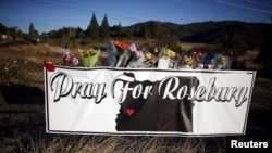 Memorial flowers are seen outside Umpqua Community College in Roseburg, Oregon, Oct. 2, 2015. 