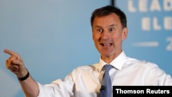 Jeremy Hunt, a leadership candidate for Britain's Conservative Party, attends an event in Wyboston, Britain, July 13, 2019. Hunt, Britain's foreign secretary, says the Iran nuclear deal can still be saved.