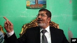 Egyptian presidential candidate Mohamed Morsi, of the Muslim Brotherhood, at his home in the Delta Village, Edwa, April 23, 2012 
