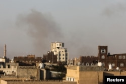 Smoke rises after Israeli strikes near Sanaa International Airport in Sanaa, Yemen, on Dec. 26, 2024.