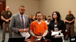 Dr. Larry Nassar, 54, appears in court for a plea hearing in Lansing, Mich., Nov. 22, 2017. Nasser, a sports doctor accused of molesting girls, pleaded guilty to multiple charges of sexual assault.