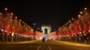FILE - This picture shows the Champs Elysee avenue during the New Year's Eve as a 8:00 pm-6:00 am curfew is implemented in France to avoid a third wave of Covid-19 infections, in Paris, Jan. 1, 2020. 