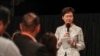 Hong Kong Leader Holds Town Hall as Protesters Chant Slogans
