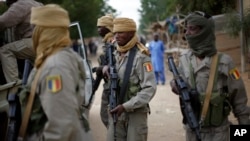 In this picture taken on January 28, 2013, Chadian soldiers patrol the streets of Gao, northern Mali.