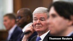 FILE - NCAA President Mark Emmert testifies on college athlete name, image and likeness rights during a hearing of the Senate Commerce, Science and Transportation Committee on Capitol Hill in Washington, June 9, 2021. 