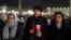 Catholic faithful attend a nightly rosary prayer service for the health of Pope Francis in St. Peter's Square at the Vatican, Feb. 26, 2025. 