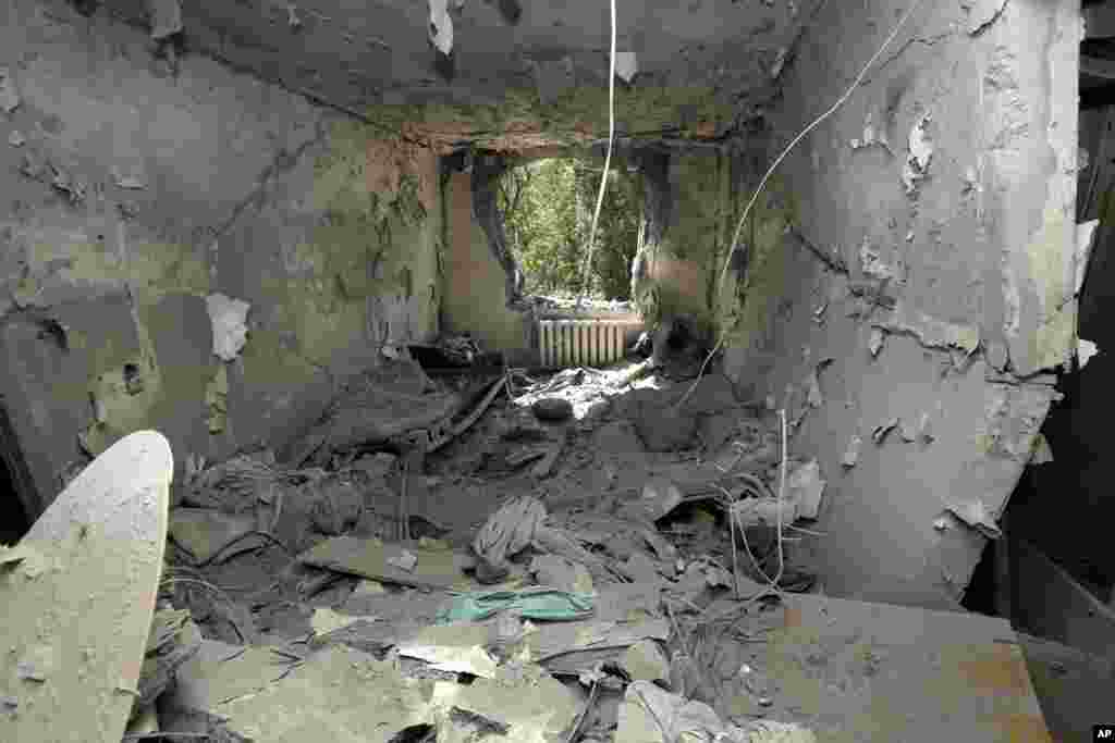 A damaged apartment after shelling in Donetsk, eastern Ukraine, Aug. 13, 2014.
