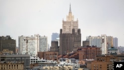 FILE - The building of the Russian Foreign Ministry, center, is seen in Moscow, Russia, March 28, 2018.
