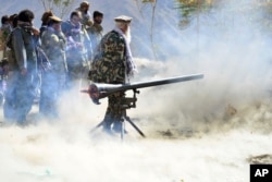 Militiamen loyal to Ahmad Massoud, son of the late Ahmad Shah Massoud, take part in a training exercise, in Panjshir province, northeastern Afghanistan, Monday, Aug. 30, 2021.
