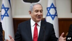 Israeli Prime Minister Benjamin Netanyahu chairs the weekly cabinet meeting in Jerusalem, March. 8, 2020. 