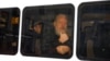 WikiLeaks founder Julian Assange is seen in a police van after he was arrested by British police outside the Ecuadorian embassy in London, April 11, 2019.