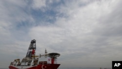 Turkey's 230-meter (750-foot) drillship 'Yavuz' crosses the Marmara Sea on its way to the Mediterranean, from the port of Dilovasi, June 20, 2019. 