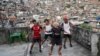 FILE - Youths perform a street dance style known as passinho for their social media accounts, in the Rocinha favela of Rio de Janeiro, April 17, 2024. 