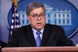 FILE - Attorney General William Barr speaks in the James Brady Briefing Room in Washington, March 23, 2020.