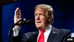 President Donald Trump speaks at the American Farm Bureau Federation's 100th Annual Convention, Jan. 14, 2019, in New Orleans. 