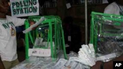 Preparing to start counting votes at a polling station in Abuja, Nigeria's capital