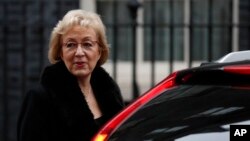 FILE - Andrea Leadsom, leader of the House of Commons, leaves after attending a cabinet meeting at 10 Downing Street, in London, Dec. 18, 2018.