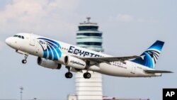 FILE - An EgyptAir Airbus A320 with the registration SU-GCC taking off from Vienna International Airport, Austria,August 21, 2015. 