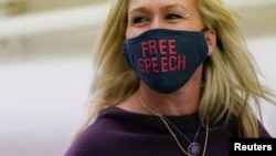 U.S. Representative Marjorie Taylor Greene (R-GA) heads to the U.S. Capitol prior to a vote in the U.S. House of Representives on a resolution that would punish her for remarks supporting violence against Democrats, on Capitol Hill, Feb. 4, 2021.