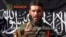 FILE - Wanted terrorist Mokhtar Belmokhtar speaks in this undated still image taken from video released by Sahara Media, Jan. 21, 2013.